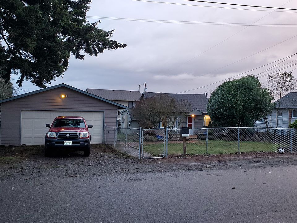 Includes garage and fenced yard.