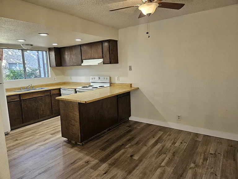 Whispering Trees Apartments — Photo 1