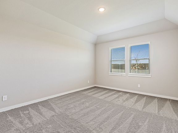 Primary suite in the Willow home plan by Trophy Signature Homes - REPRESENTATIVE PHOTO