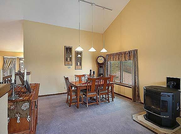 Dining Rm features decorator lighting & large picture window.