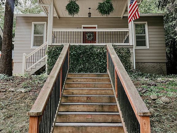 New stairs leading from the driveway up to the front porch