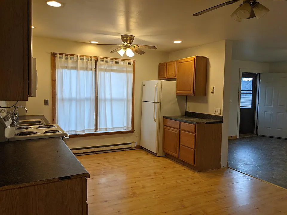 KITCHEN AND FRONT ENTRANCE WAY