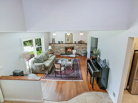 Entrance hall facing living room and entrance to kitchen