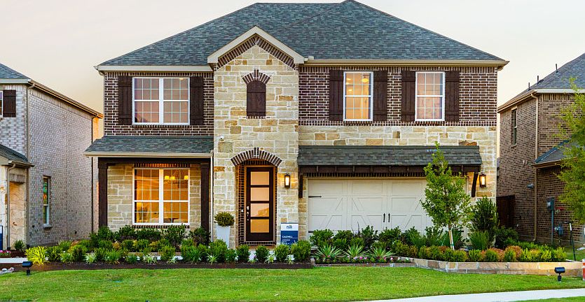 The Caldwell, a two-story home with 2-car garage, shown as Home Exterior D