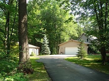 This one is part way down the newer paved driveway