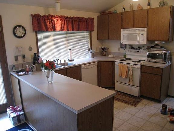 Kitchen opens to familyro