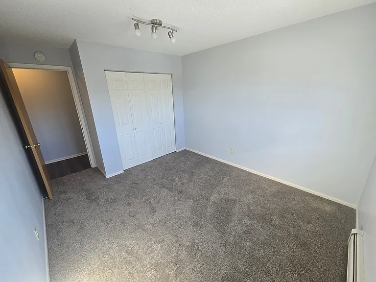 Bedroom two with view of closet.