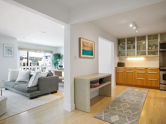 Entry with view to Living/Dining Room and Kitchen