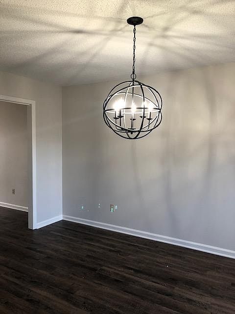 Dining room with modern lighting.