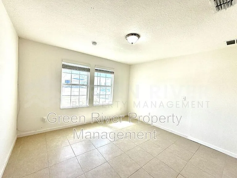 8704 Lake George Cir W — Photo 29