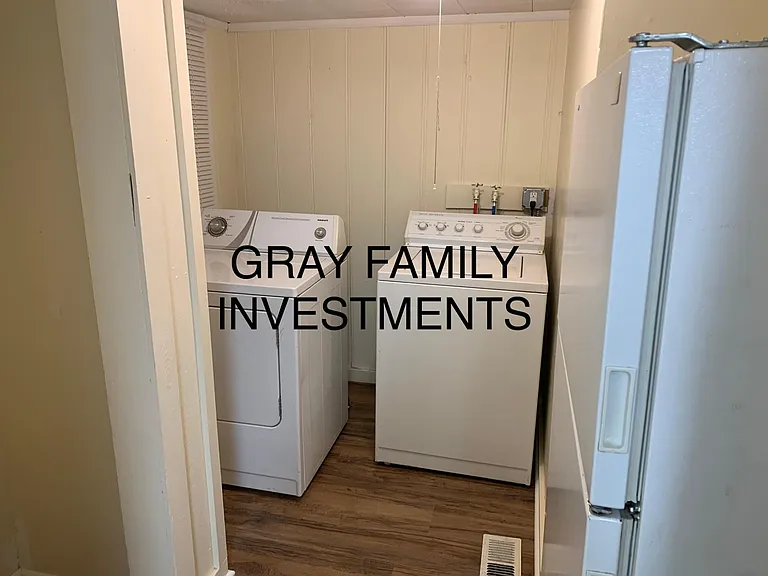 Laundry room w/extra refrigerator!