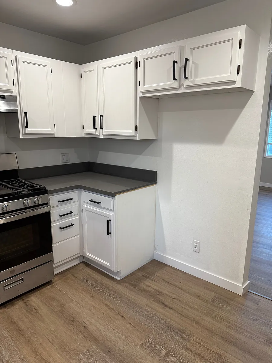 Remodeled kitchen. Quartz counters. - 15830 S Vermont Ave #11