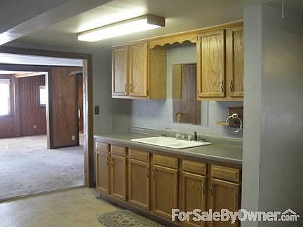 Ktchen with view into living room.