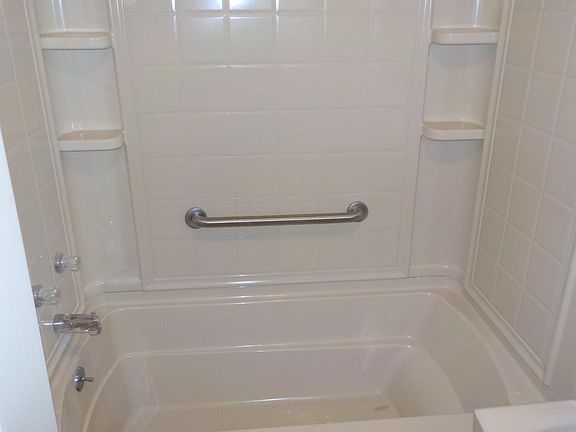 Tub and shower unit