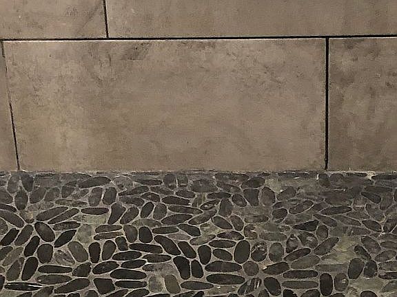 Pebble floor shower