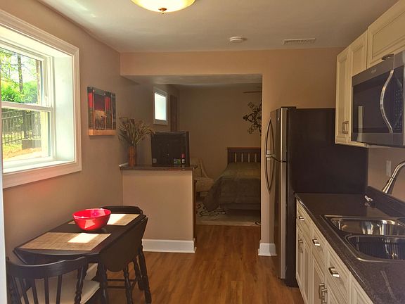 Gorgeous natural light, cabinets galore, brand new appliance