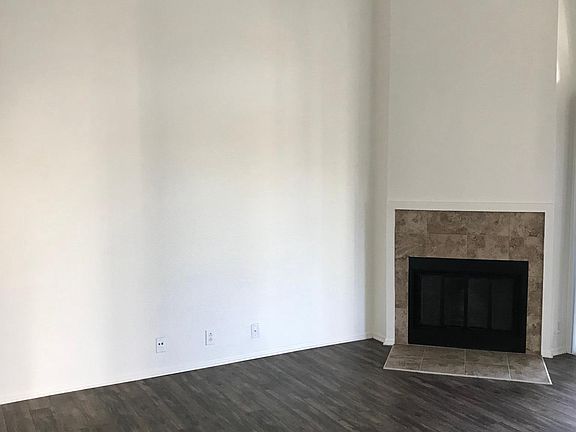 Living Room with Wood Burning Fireplace