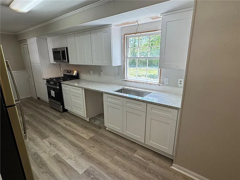5594 Laurel Ln NW — Photo 26