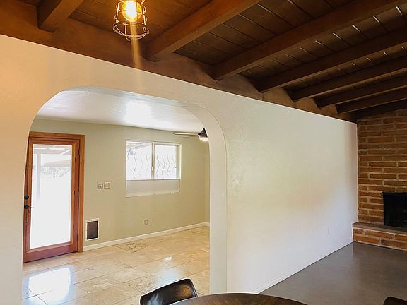 room adjacent to living room/kitchen can be used as office, dining room, craft room, or play room