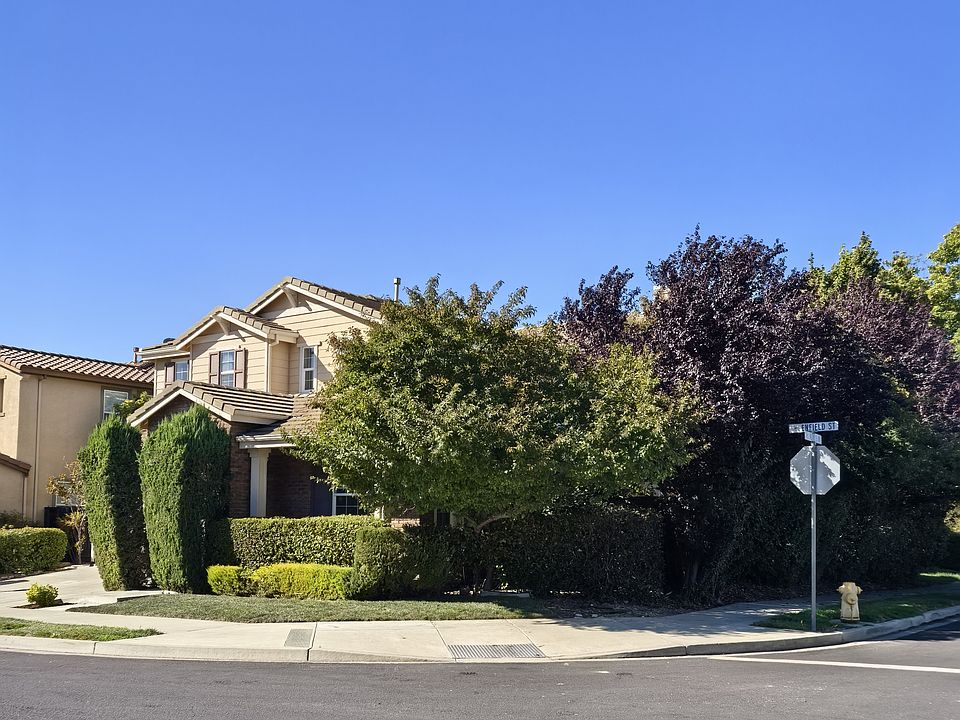 Desirable corner-lot location single family house with two car garage offering added privacy, abundant natural light, and an open, airy feel. Owner pays for gardener.