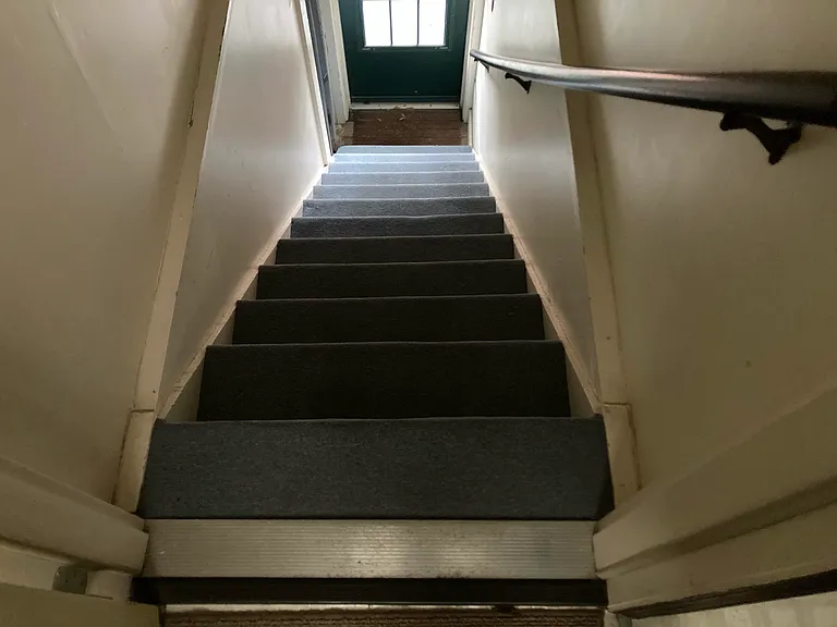 12 stairs entrance to apartment
