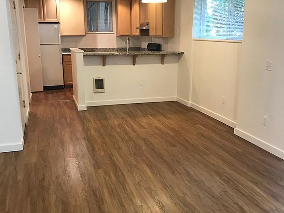 Open Floor Plan. Wood floors. Kitchen with wak in pantry.
