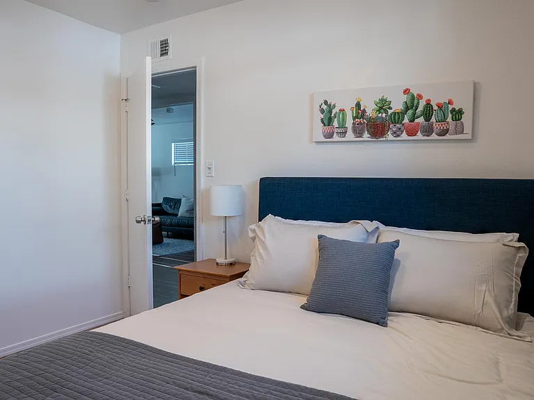 Secondary bedroom with nightstand