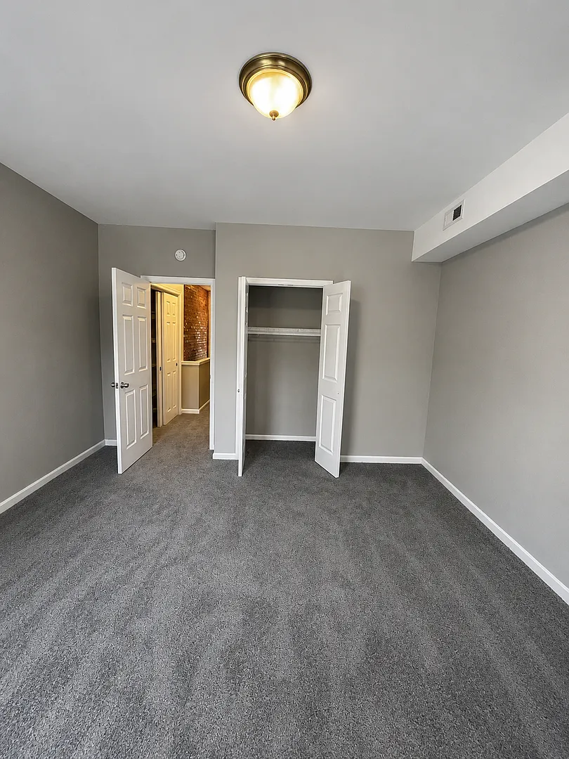 Charming Baltimore Rowhome with Private Deck & Exposed Brick — Photo 1