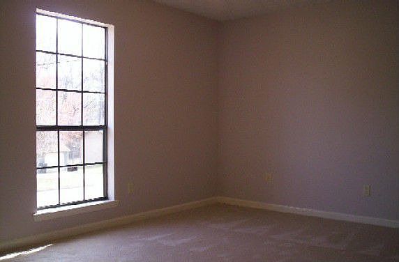 One of three bedrooms