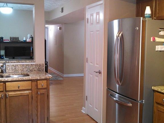 Kitchen w/SS Gas Stove and SS Refrigerator
