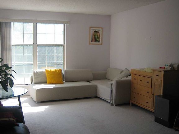 Living Room features sliders to private balcony