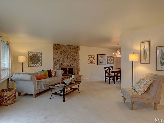 Large living room with tons of space and natural light. Sliding glass door opens to back deck. 