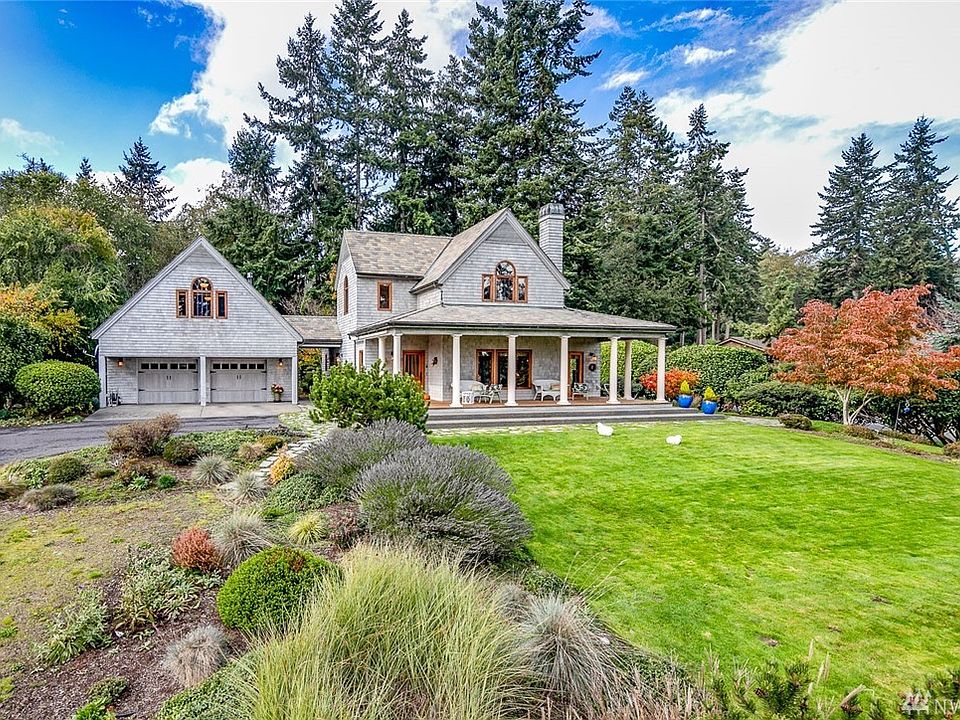 Custom-built Craftsman style home, set on a 1/2 acre double lot in the beautiful gated community of Kala Point.  