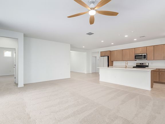 Kitchen, living room, dining room, and master bedroom