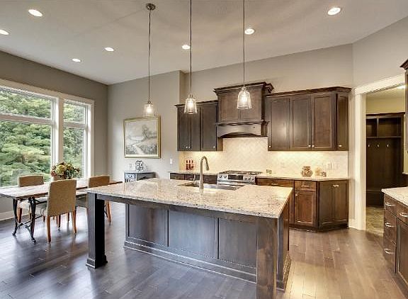 Custom designed wood hood / vent. Oversized center-island!