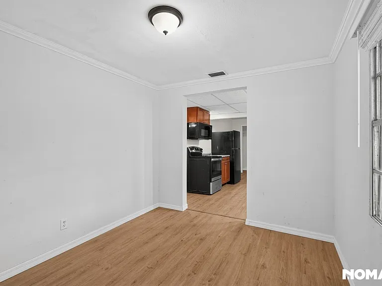 8915 N Orleans Ave — Photo 13