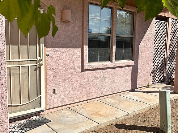 Front door on side of townhouse