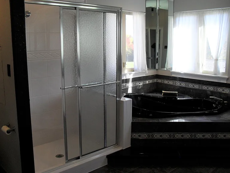 Master bath. Tub has whirlpool jets.