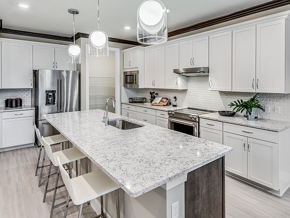 Kitchen With Designer Finishes And Large Center Island