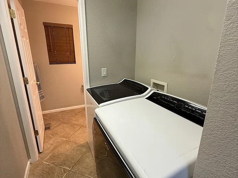 Laundry room, washer and dryer not provided