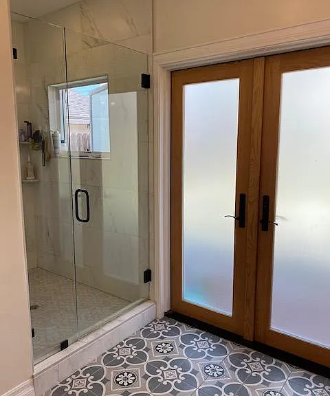 Spa-like shower, French doors leading to backyard, tall ceilings