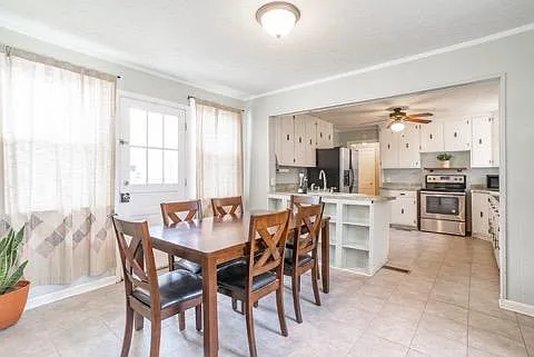 Photo 6. Open Dining Room and Kitchen with another exit