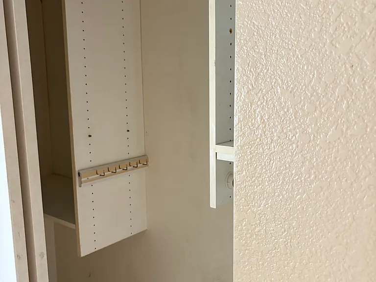 Closet organizer in bedroom 2
