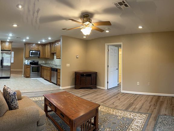 Second living/family room open to kitchen. French doors exit to back yard patio