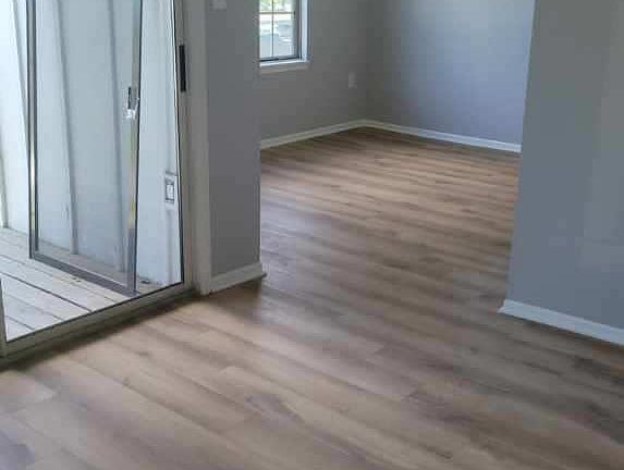 Dining room and slider to porch view from living room