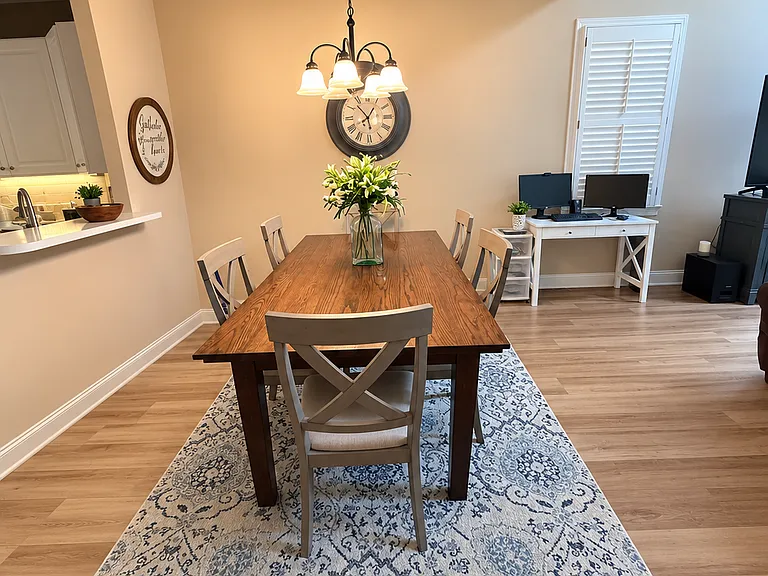 dining room open to the kitchen and living room
