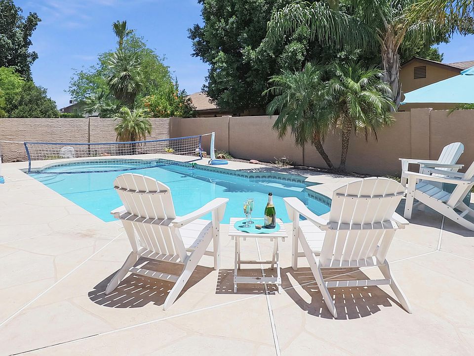 Private outdoor poolside seating and games