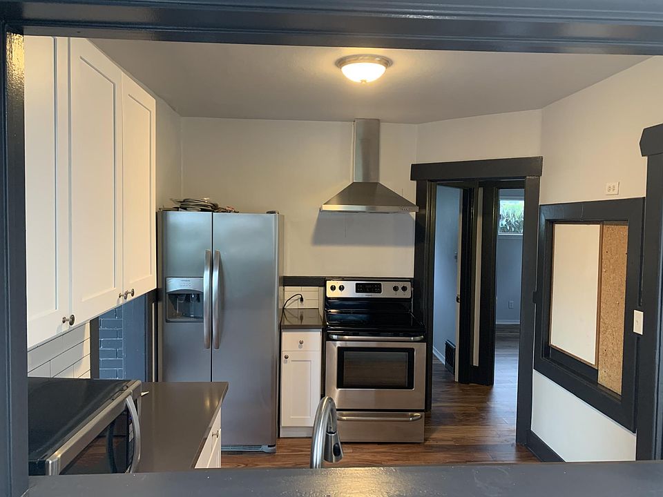 Kitchen with new cabinets, sink and countertop
