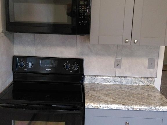 New Whirlpool Self cleaning Range and built in Microwave oven