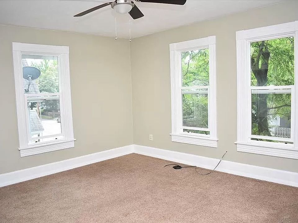 Large front living room with newer windows.
